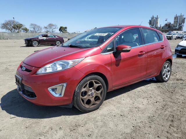 FORD FIESTA SES 2012 with VIN 3FADP4FJ3CM154052 - Photo from auction