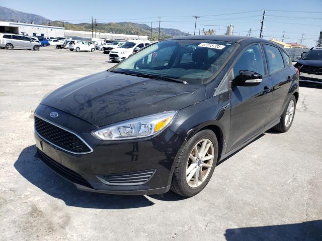 FORD FOCUS SE 2015 with VIN 1FADP3K24FL282377 - Photo from auction