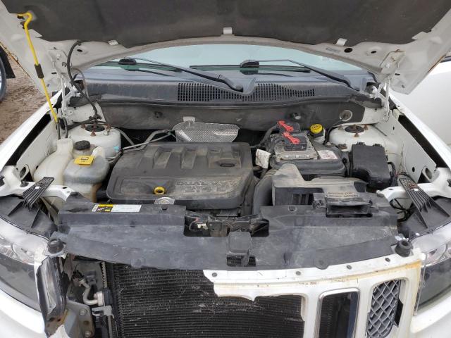 Photo 12 from auction – 2014 JEEP COMPASS LA with VIN 1C4NJDEB4ED852839