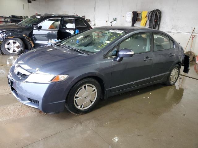 HONDA CIVIC HYBR 2010 with VIN JHMFA3F23AS004114 - Photo from auction