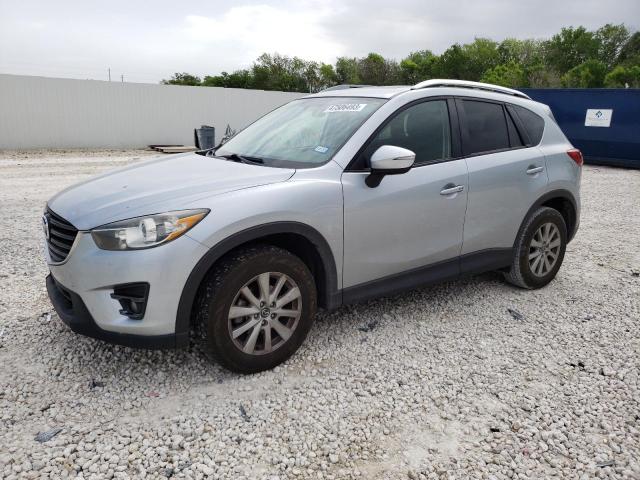 MAZDA CX-5 TOURI 2016 with VIN JM3KE2CY4G0648837 - Photo from auction
