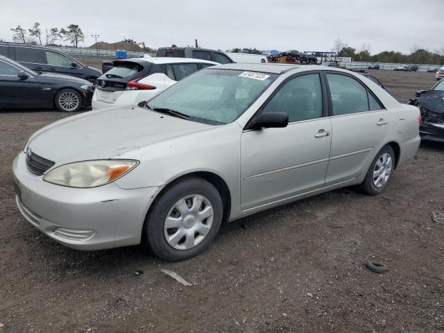 TOYOTA CAMRY LE 2002 with VIN 4T1BE32KX2U002646 - Photo from auction