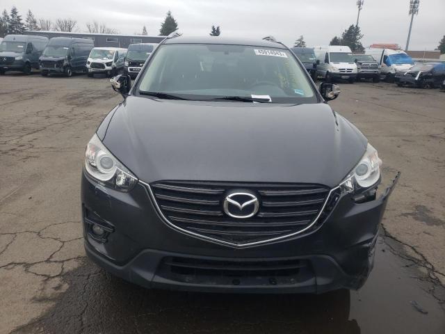 Photo 5 from auction – 2016 MAZDA CX-5 TOURI with VIN JM3KE2CY4G0859438