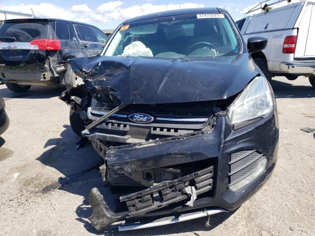Photo 5 from auction – 2016 FORD ESCAPE SE with VIN 1FMCU0G9XGUC29516