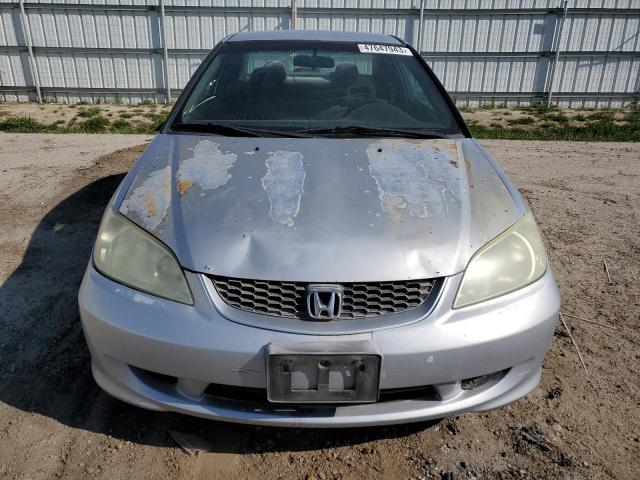 Photo 5 from auction – 2004 HONDA CIVIC DX V with VIN 1HGEM21144L043159