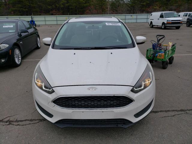 Photo 5 from auction – 2015 FORD FOCUS TITA with VIN 1FADP3J20FL291529