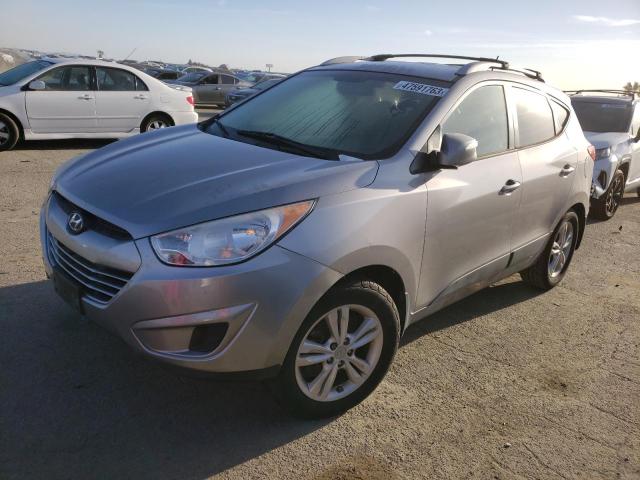HYUNDAI TUCSON GLS 2012 with VIN KM8JUCAC6CU533918 - Photo from auction
