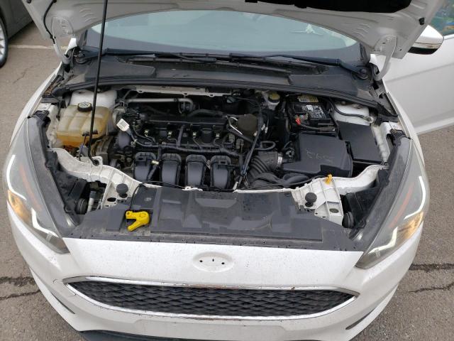 Photo 11 from auction – 2015 FORD FOCUS TITA with VIN 1FADP3J20FL291529