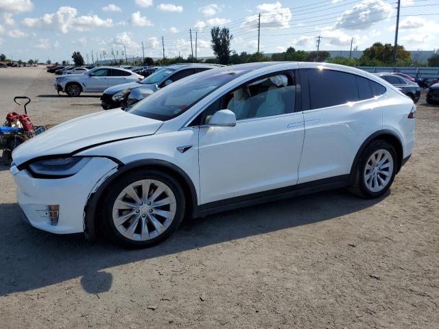 TESLA MODEL X 2018 with VIN 5YJXCBE29JF122192 - Photo from auction