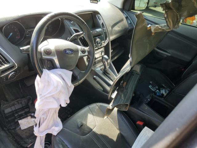 Photo 8 from auction – 2014 FORD FOCUS TITA with VIN 1FADP3J27EL446320