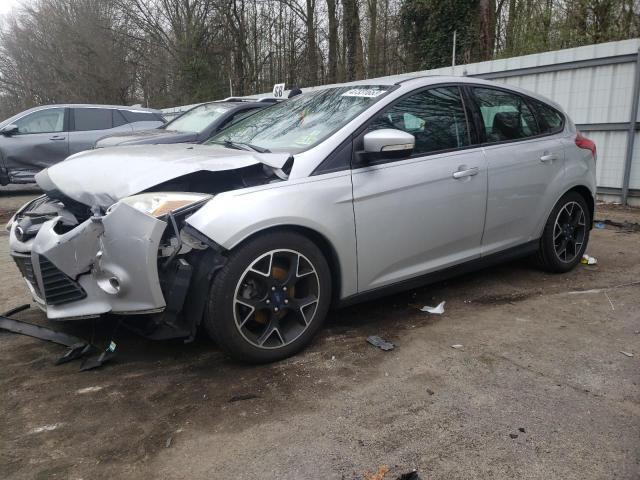 FORD FOCUS SE 2014 with VIN 1FADP3K25EL189219 - Photo from auction