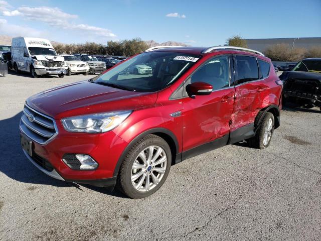 FORD ESCAPE TIT 2017 with VIN 1FMCU0JDXHUC35024 - Photo from auction