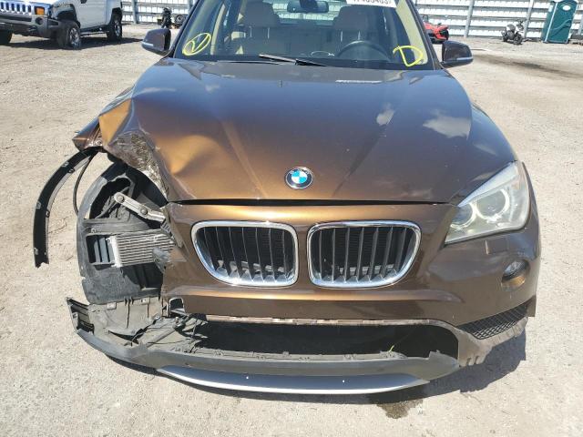 Photo 11 from auction – 2013 BMW X1 XDRIVE3 with VIN WBAVM5C57DVV89407