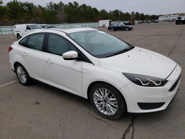 Photo 4 from auction – 2015 FORD FOCUS TITA with VIN 1FADP3J20FL291529