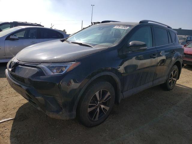 Photo 1 from auction – 2018 TOYOTA RAV4 LE with VIN 2T3ZFREV9JW509502