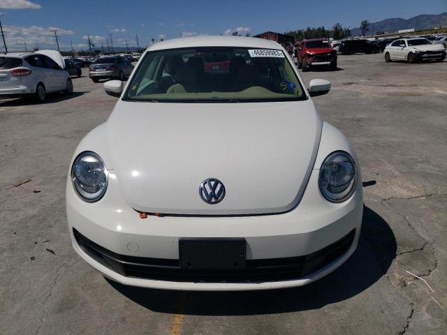 Photo 5 from auction – 2014 VOLKSWAGEN BEETLE with VIN 3VWJP7AT5EM628137