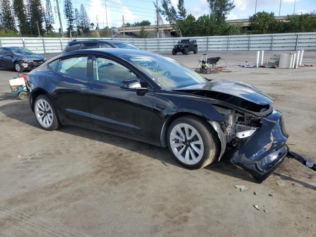 Photo 4 from auction – 2022 TESLA MODEL 3 with VIN 5YJ3E1EA0NF369648