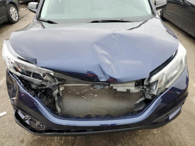 Photo 12 from auction – 2015 HONDA CR-V LX with VIN 5J6RM4H30FL013740