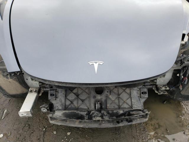 Photo 11 from auction – 2022 TESLA MODEL 3 with VIN 5YJ3E1EB0NF231617