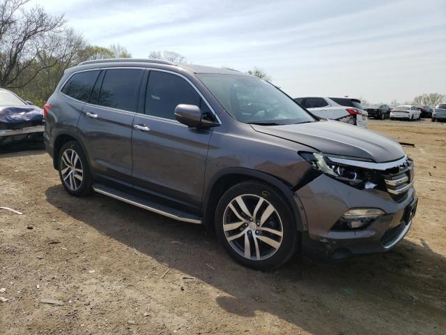 Photo 4 from auction – 2017 HONDA PILOT ELIT with VIN 5FNYF6H06HB007413
