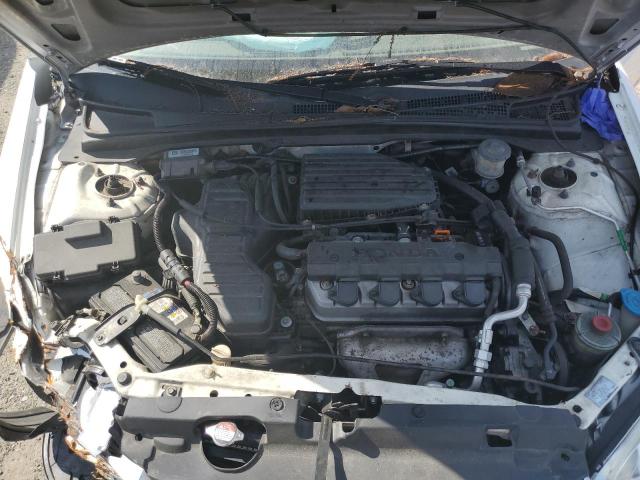 Photo 11 from auction – 2004 HONDA CIVIC LX with VIN 1HGEM22564L039292