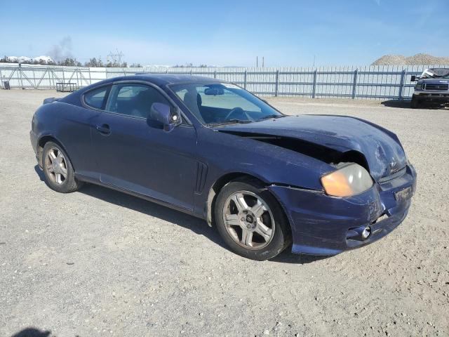 Photo 4 from auction – 2003 HYUNDAI TIBURON with VIN KMHHM65D13U074168