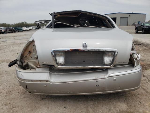 Photo 6 from auction – 2004 LINCOLN TOWN CAR U with VIN 1LNHM83W04Y677333