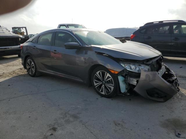 Photo 4 from auction – 2018 HONDA CIVIC EX with VIN JHMFC1F36JX013545