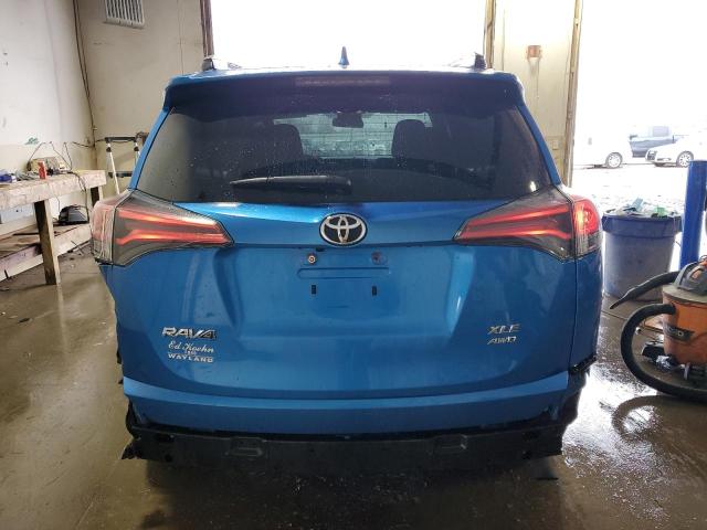 Photo 6 from auction – 2017 TOYOTA RAV4 XLE with VIN 2T3RFREV6HW555945