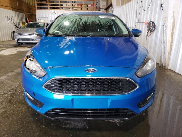 Photo 5 from auction – 2016 FORD FOCUS SE with VIN 1FADP3F27GL303024