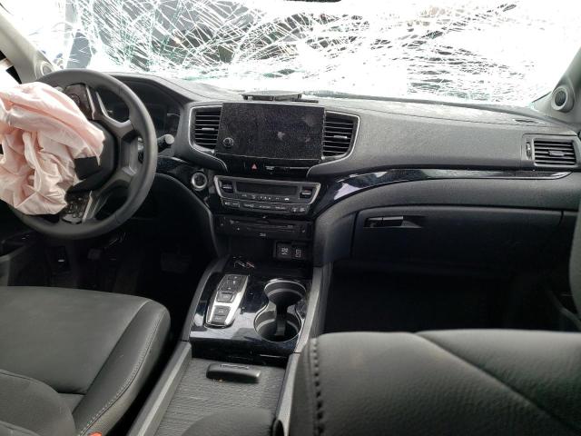 Photo 8 from auction – 2022 HONDA PILOT TOUR with VIN 5FNYF6H66NB066638