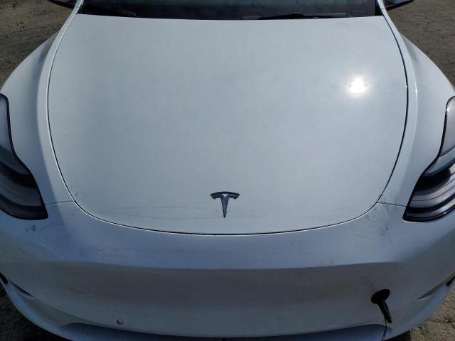 Photo 11 from auction – 2022 TESLA MODEL Y with VIN 7SAYGDEF6NF405200