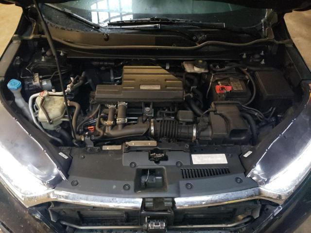 Photo 12 from auction – 2018 HONDA CR-V with VIN 2HKRW2H99JH136197
