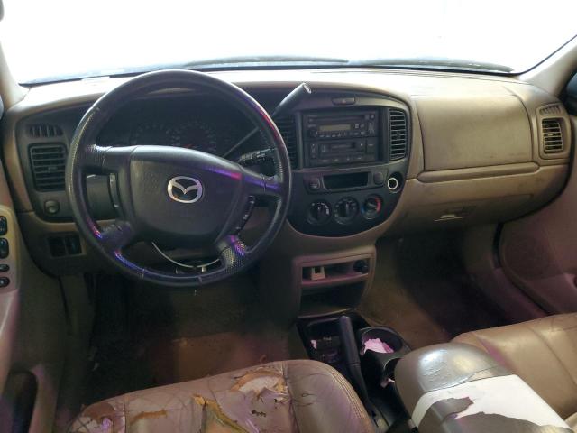 Photo 8 from auction – 2002 MAZDA TRIBUTE LX with VIN 4F2CU09162KM00049