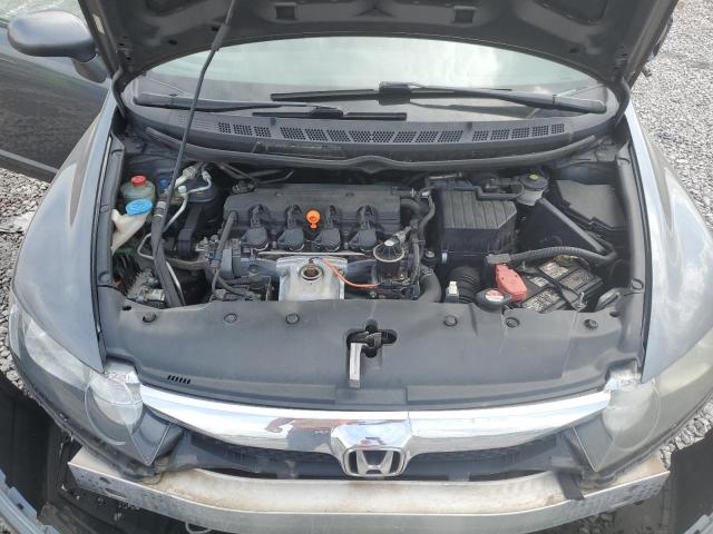 Photo 11 from auction – 2011 HONDA CIVIC LX with VIN 19XFA1F54BE016678