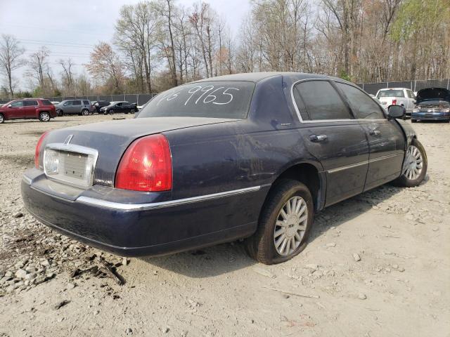 Photo 3 from auction – 2003 LINCOLN TOWN CAR E with VIN 1LNHM81W73Y689965
