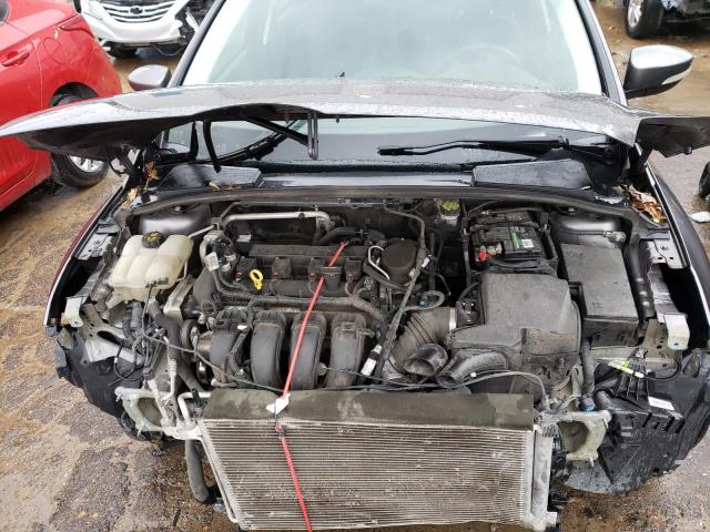 Foto 11 de la subasta – 2014 FORD FOCUS SE con VIN 1FADP3F21EL378475