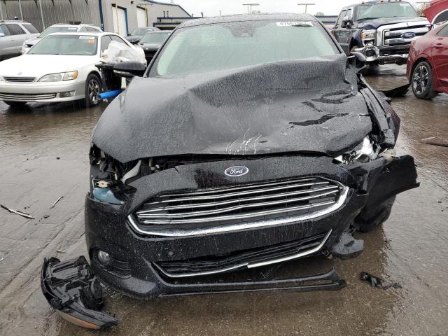 Photo 5 from auction – 2016 FORD FUSION TIT with VIN 3FA6P0K92GR297113