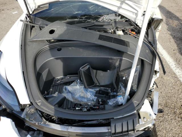 Photo 11 from auction – 2022 TESLA MODEL 3 with VIN 5YJ3E1EA9NF302644