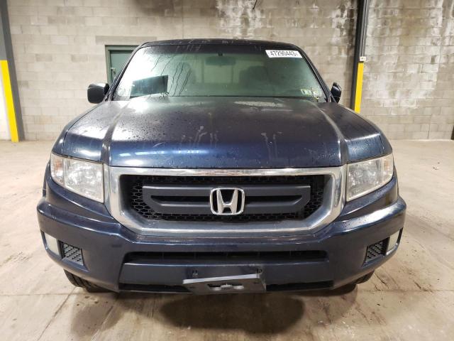 Photo 5 from auction – 2010 HONDA RIDGELINE with VIN 5FPYK1F26AB008657