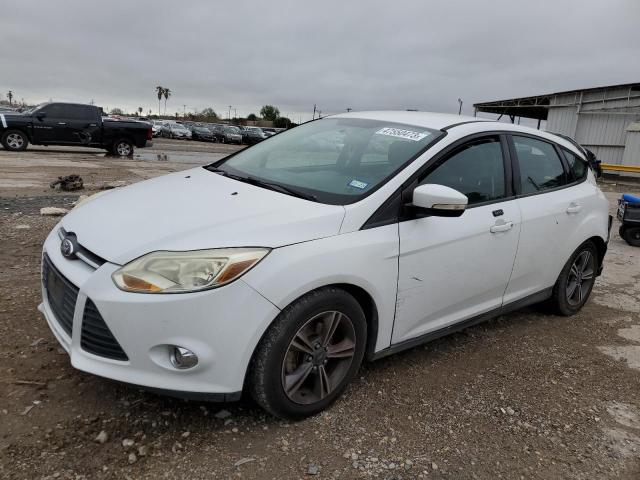 FORD FOCUS SE 2014 with VIN 1FADP3K20EL372219 - Photo from auction