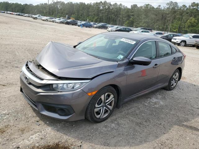 HONDA CIVIC LX 2018 with VIN 19XFC2F61JE014667 - Photo from auction