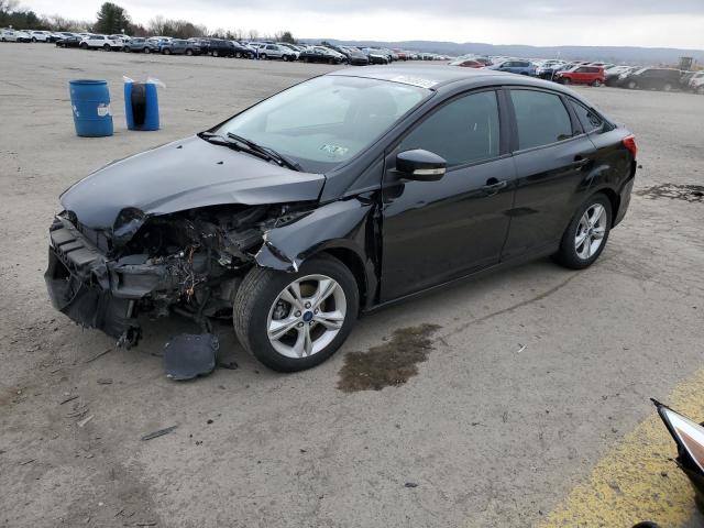 FORD FOCUS SE 2014 with VIN 1FADP3F28EL401928 - Photo from auction