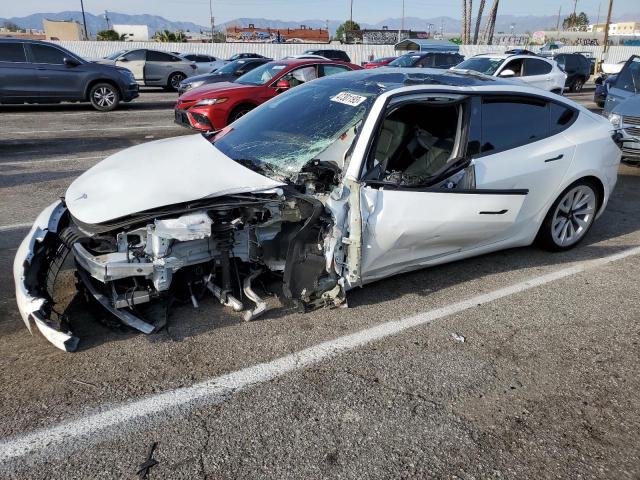 TESLA MODEL 3 2022 with VIN 5YJ3E1EA9NF302644 - Photo from auction