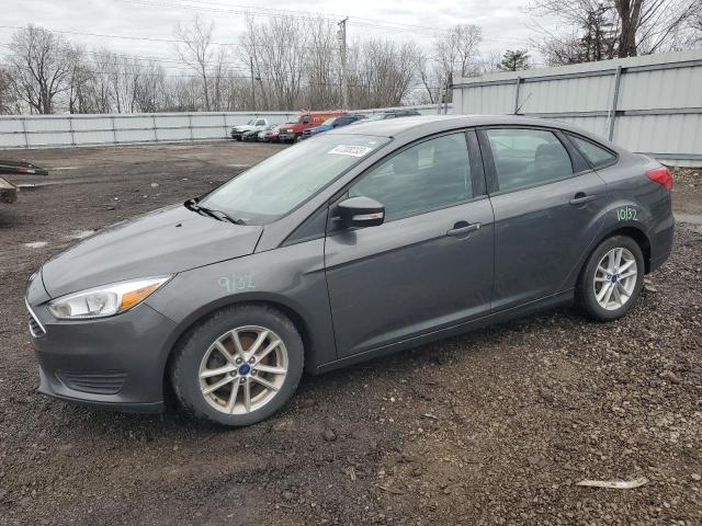 FORD FOCUS SE 2017 with VIN 1FADP3F21HL328339 - Photo from auction