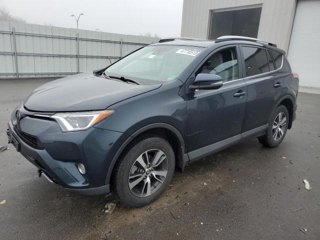 TOYOTA RAV4 ADVEN 2018 with VIN 2T3RFREV4JW750383 - Photo from auction