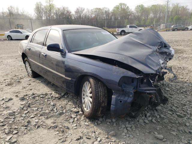 Photo 4 from auction – 2003 LINCOLN TOWN CAR E with VIN 1LNHM81W73Y689965