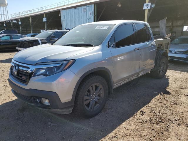 HONDA RIDGELINE 2019 with VIN 5FPYK3F1XKB040323 - Photo from auction