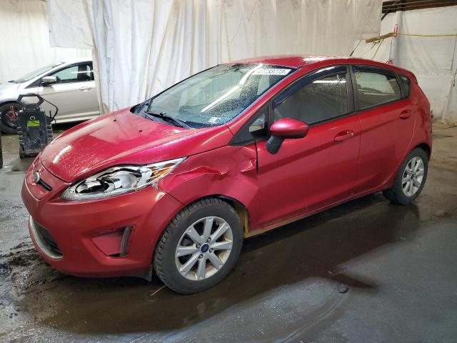 FORD FIESTA SE 2011 with VIN 3FADP4EJXBM142383 - Photo from auction