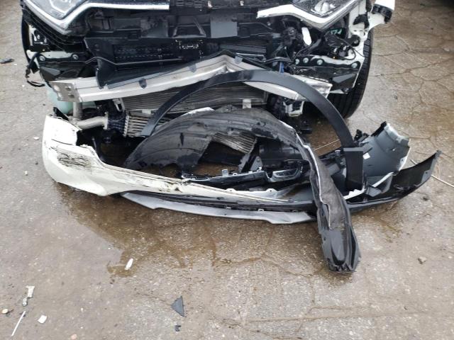 Photo 12 from auction – 2017 HONDA CR-V with VIN 2HKRW1H85HH504015